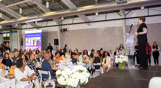 LaTonya Story, CEO and founder of LPS Consulting PR, speaks to a crowd at the 2023 Sports Power Brunch