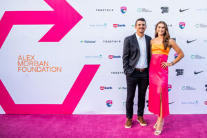 1UP Sports Marketing client Alex Morgan on the "pink carpet" at her Alex Morgan Foundation launch event