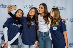 1UP Sports Marketing client Alex Morgan taking a selfie with young girls at her Alex Morgan Foundation launch event